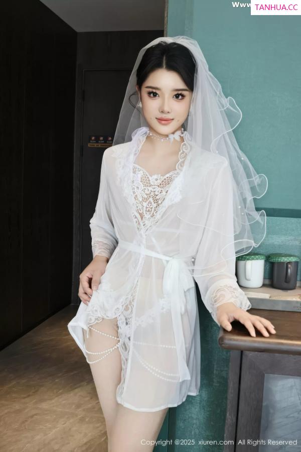   [XiuRen]高清写真图 2025.07.18 No.10559 糯梨子 白色婚纱第5张图片